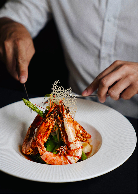 Chef Finishing Gourmet Dish
